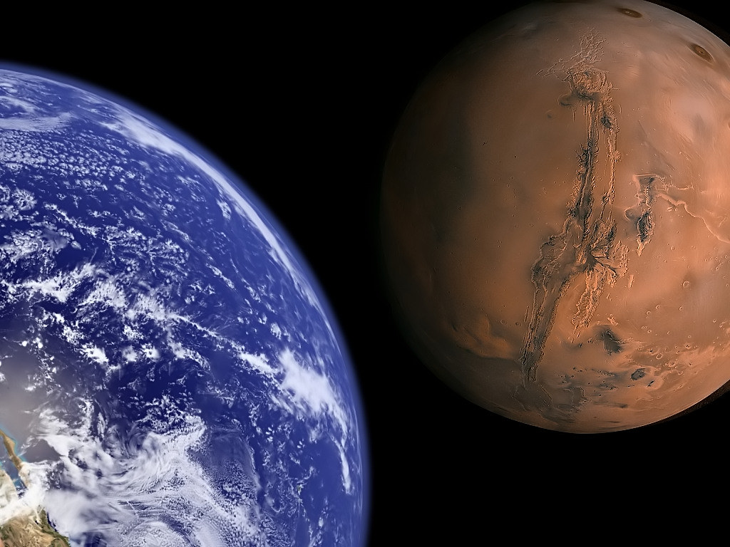 Earth and Mars to scale.