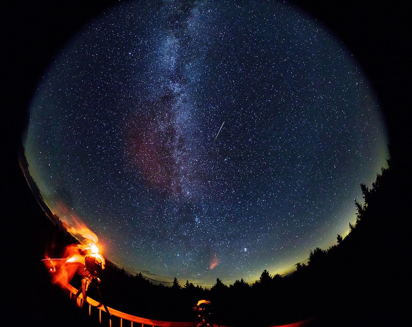 A Perseid meteor crossing the starry sky